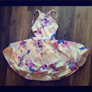 Flirty backless floral mini dress